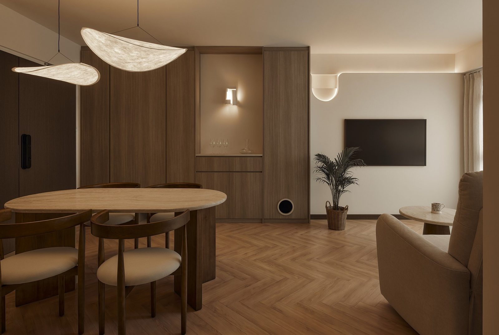 Chevron-pattern Sierra oak vinyl flooring in a Singapore living-dining room